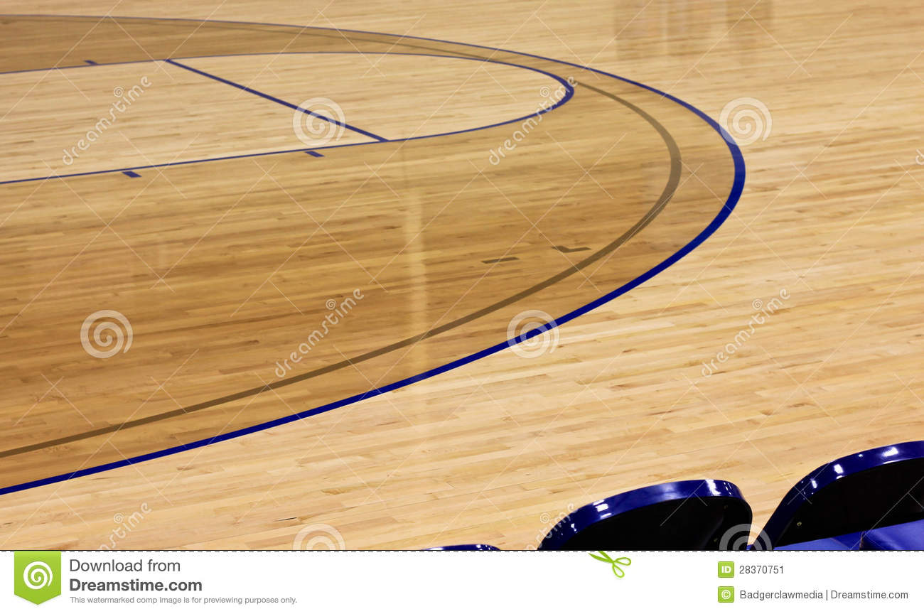 Sideline View Behind The Players Chairs Of A Basketball Hardwood Court