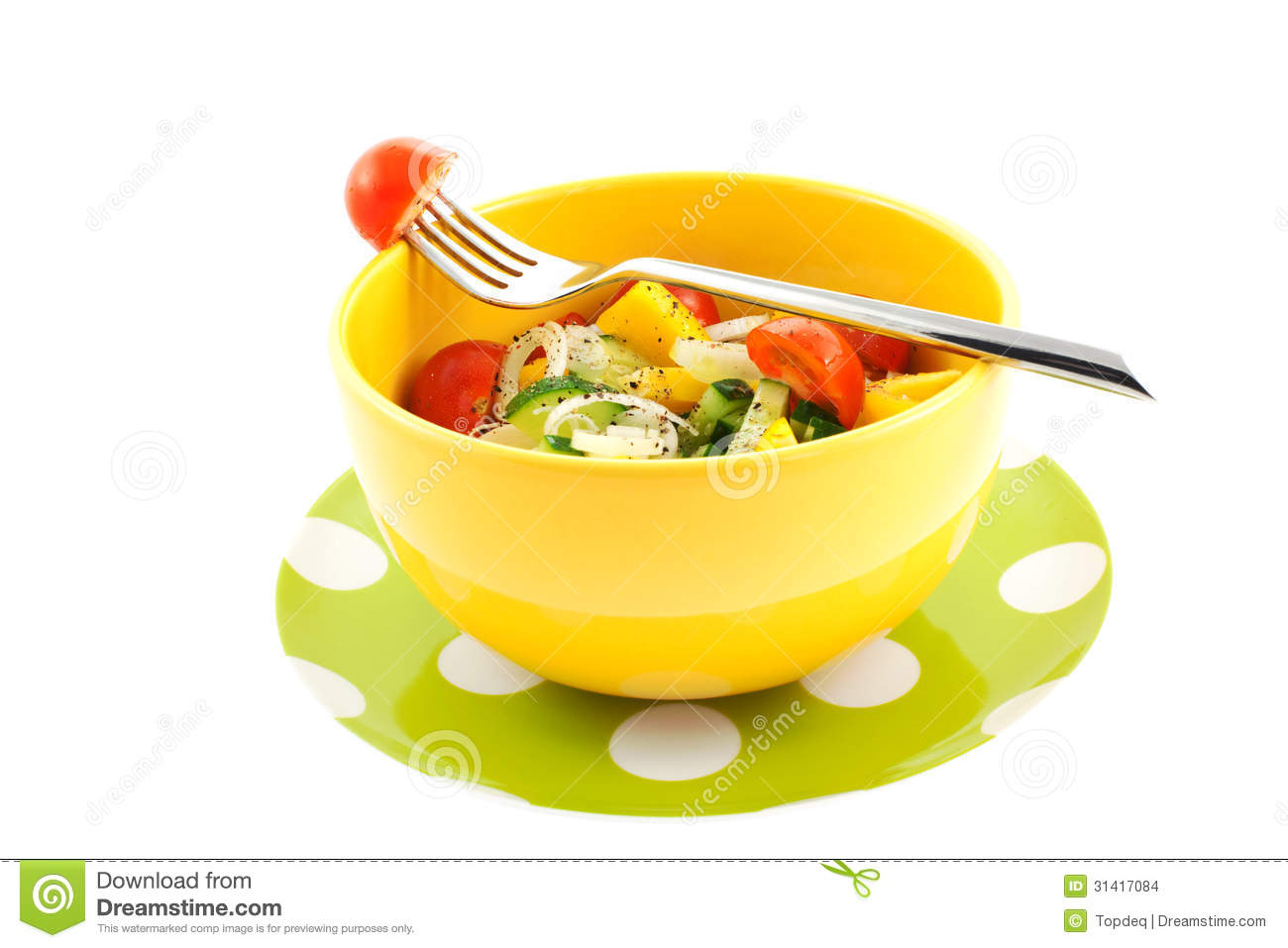 Vegetable Salad In A Yellow Bowl And Fork With Tomato Isolated On A    