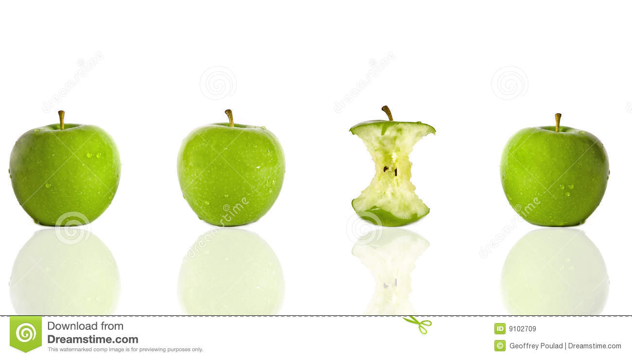 Three Green Apples And One Apple Core With Reflection And Isolated On
