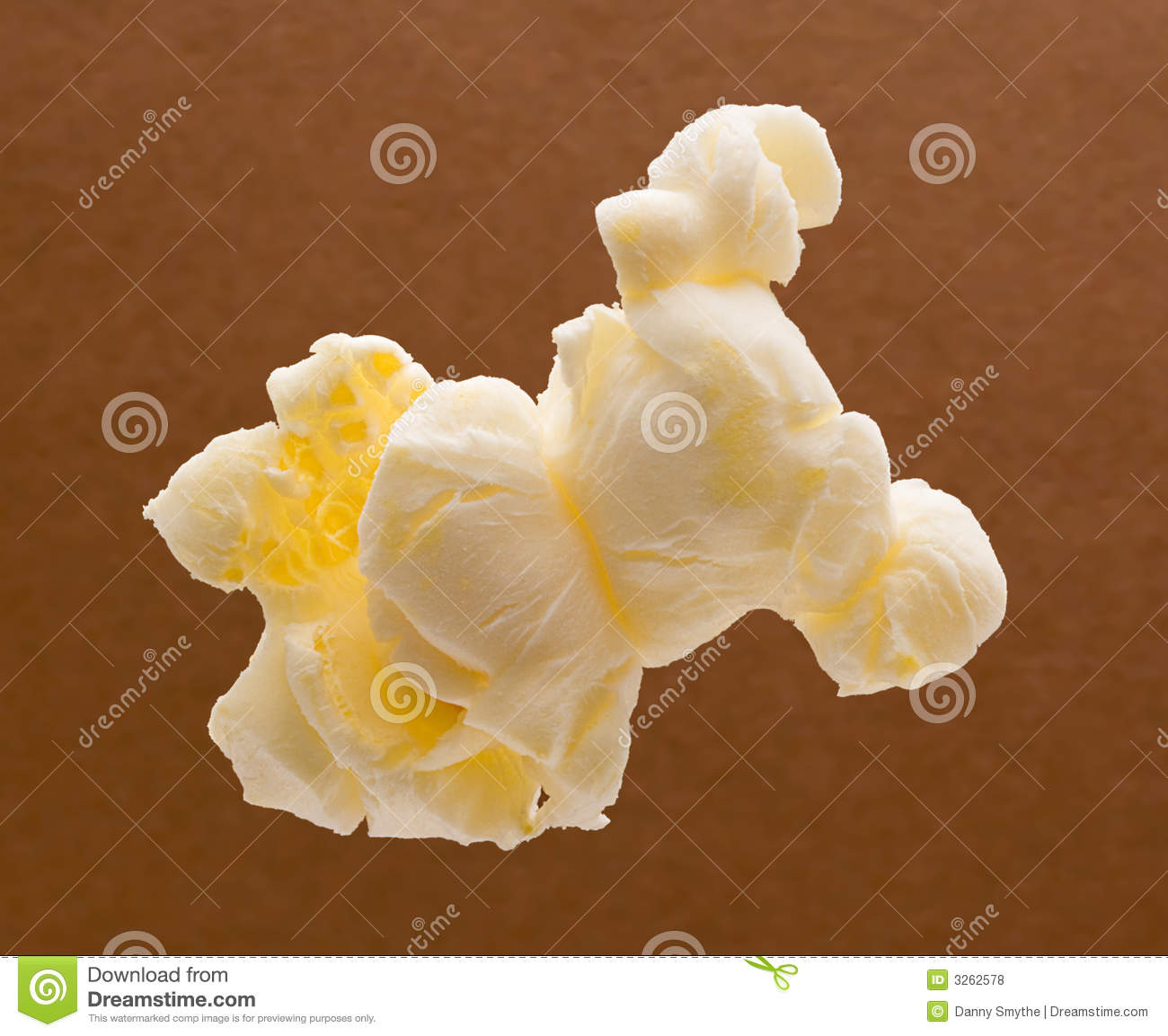 Popcorn Isolated Against A Brown Background Isolation Is On A    