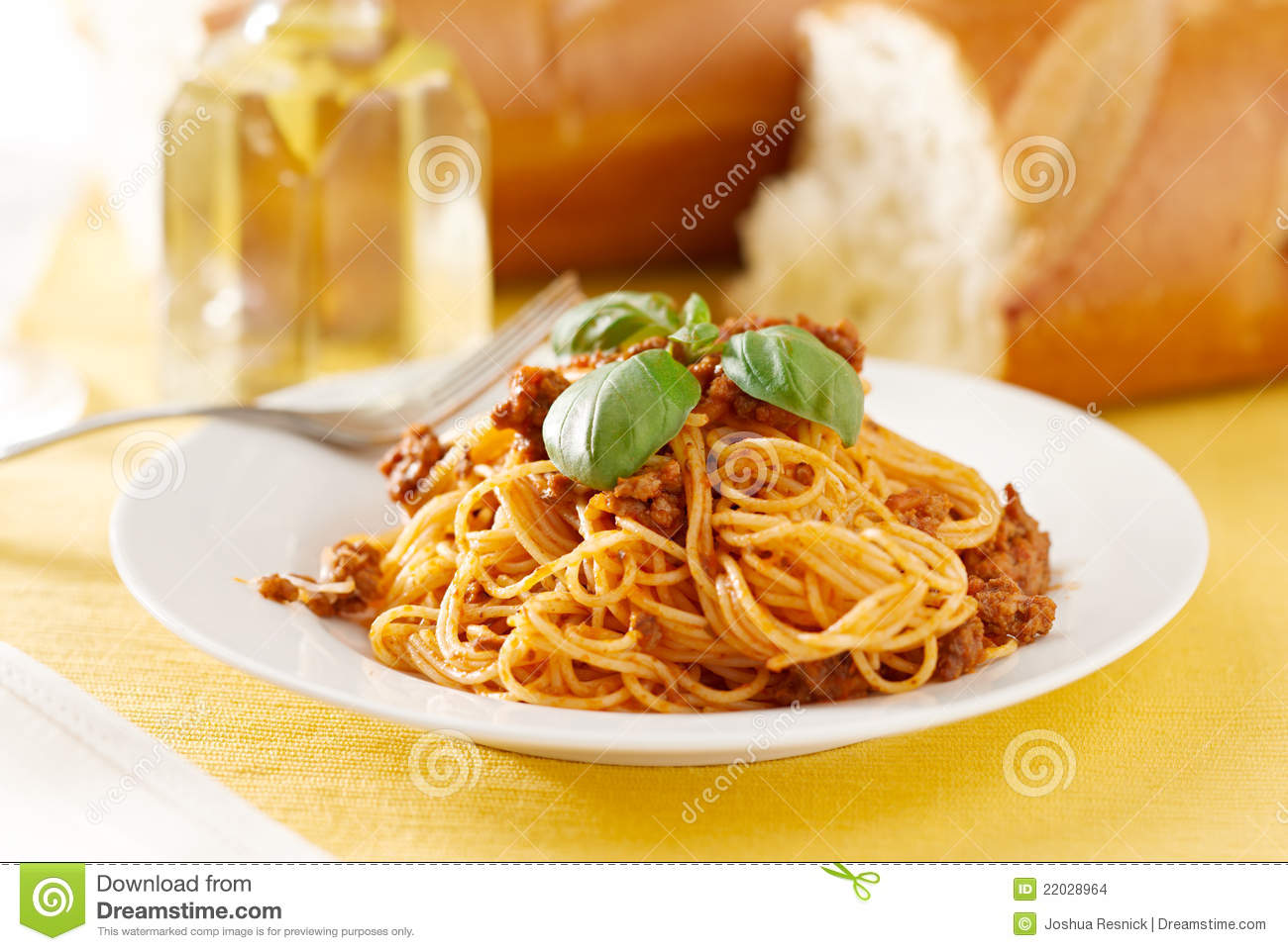 Photo Of Spaghetti With Basil Garnish With Meat Sauce  Shot With