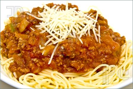 Picture Of A Plate Of Spaghetti With Meat Sauce And Parmesan Cheese