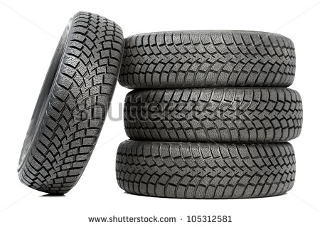 Stack Of Four Wheel New Black Tyres For Winter Car Driving Isolated On    