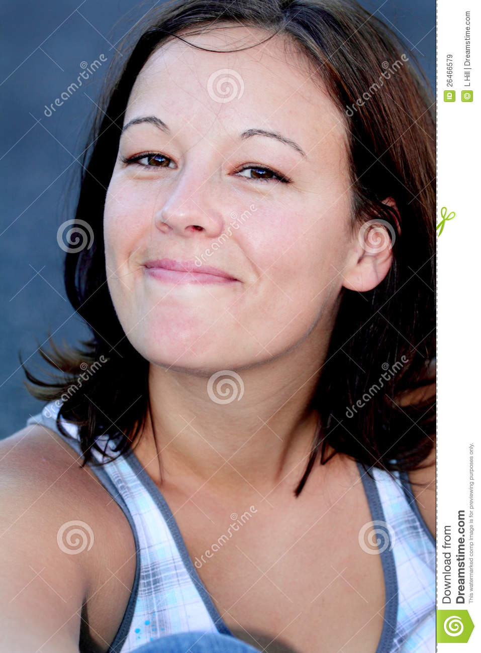 Closeup Of A Pretty Young Dark Haired College Girl Or Young Mother    