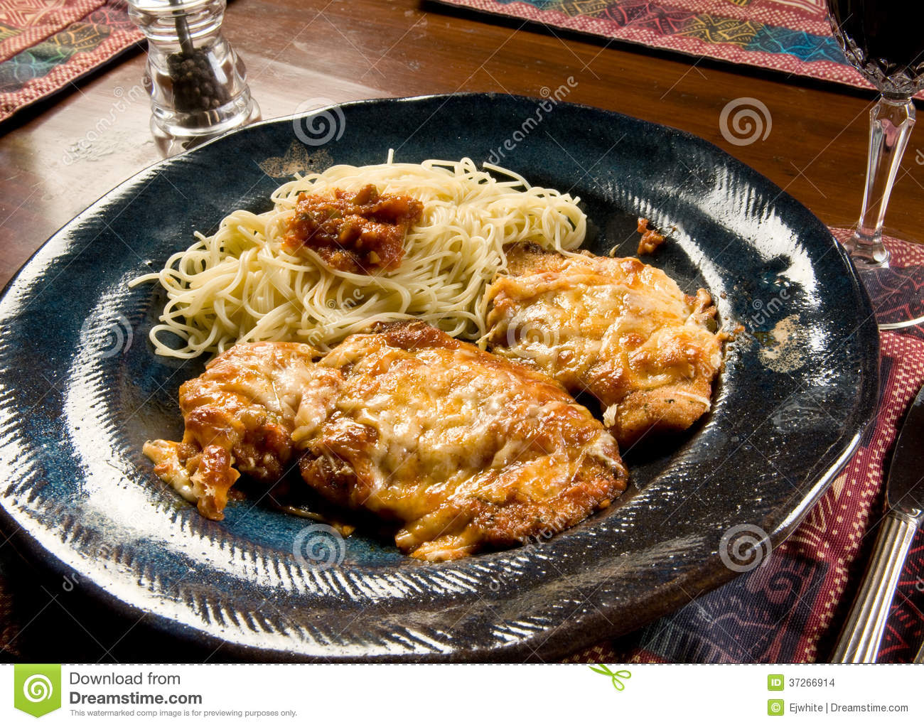 Serving Of Chicken Parmigiana  Chicken Parmesan  With Angle Hair Pasta