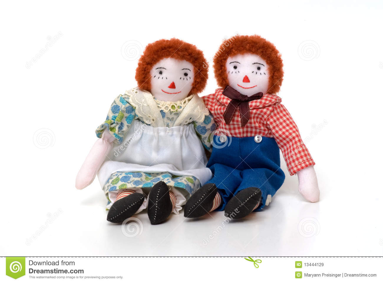 Raggedy Ann And Andy Cloth Dolls Sitting Together Royalty Free Stock    