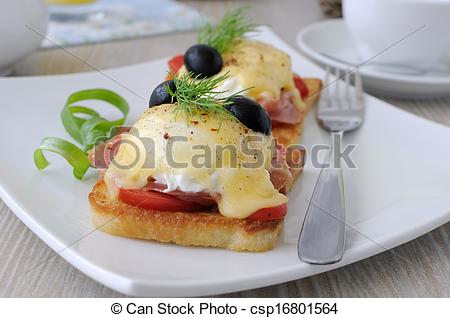 Eggs Benedict With Ham And Tomato On Toast With Cheese   Csp16801564