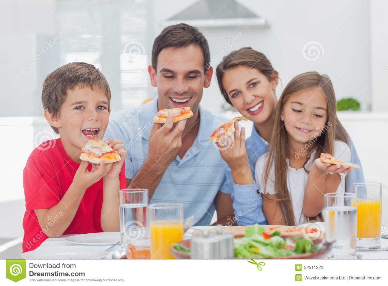 Stock Photography  Family Eating Pizza Slices