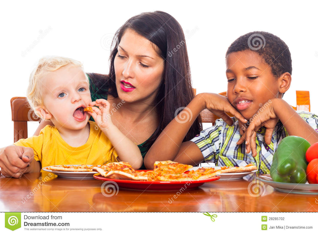 Young Mother With Children Eating Pizza Isolated On White Background