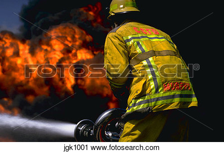 Stock Photography   Fireman Using Hose To Fight Fire   Fotosearch