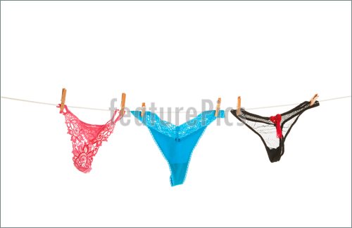Intimates Hung On The Clothes Line To Dry  Shot On White Background