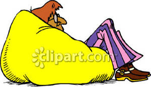 1970 S Man Sitting In A Bean Bag Chair Royalty Free Clipart Picture