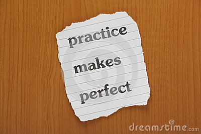 Practice Makes Perfect Reminder Note On A Wooden Background 