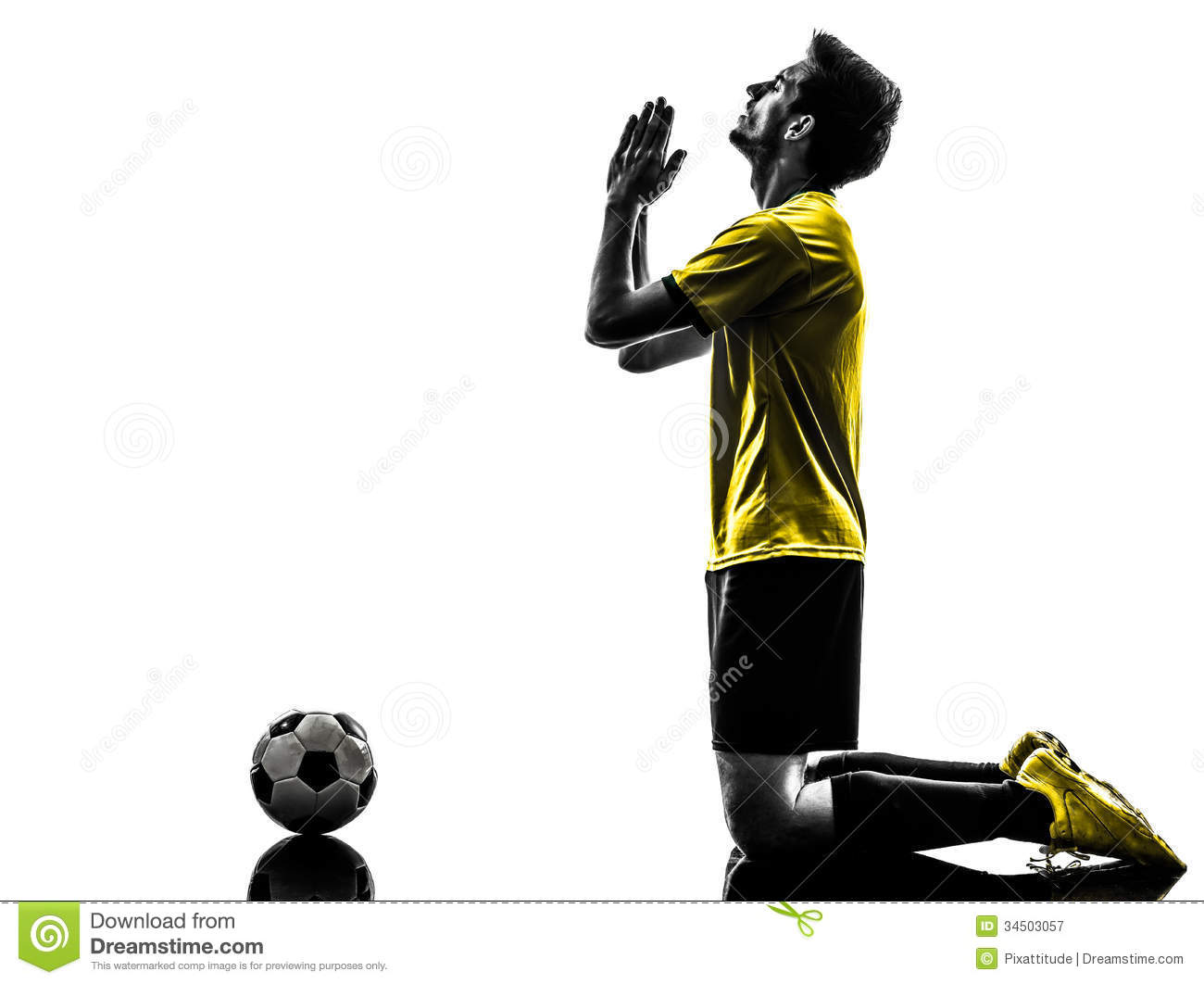 One Brazilian Soccer Football Player Young Man Praying In Silhouette