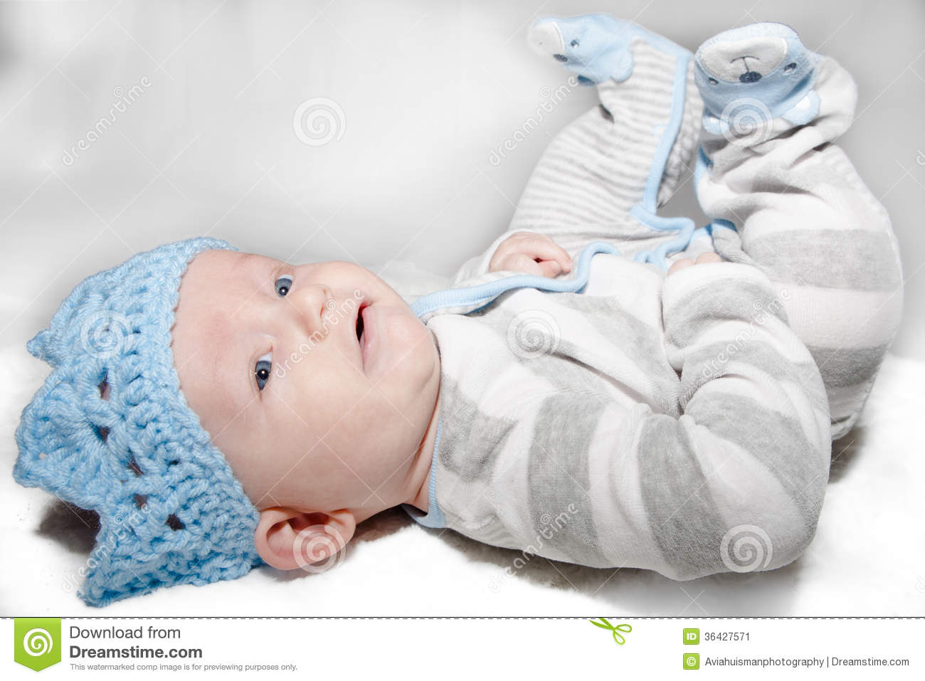 Baby Laying On Back Wearing Blue Knit Crown Stock Image   Image    