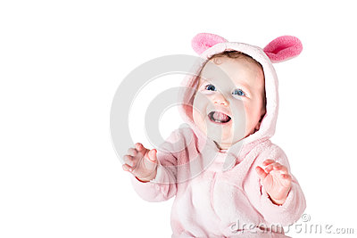 Funny Beautiful Baby With Blue Eyes Wearing A Bunny Costume Playing