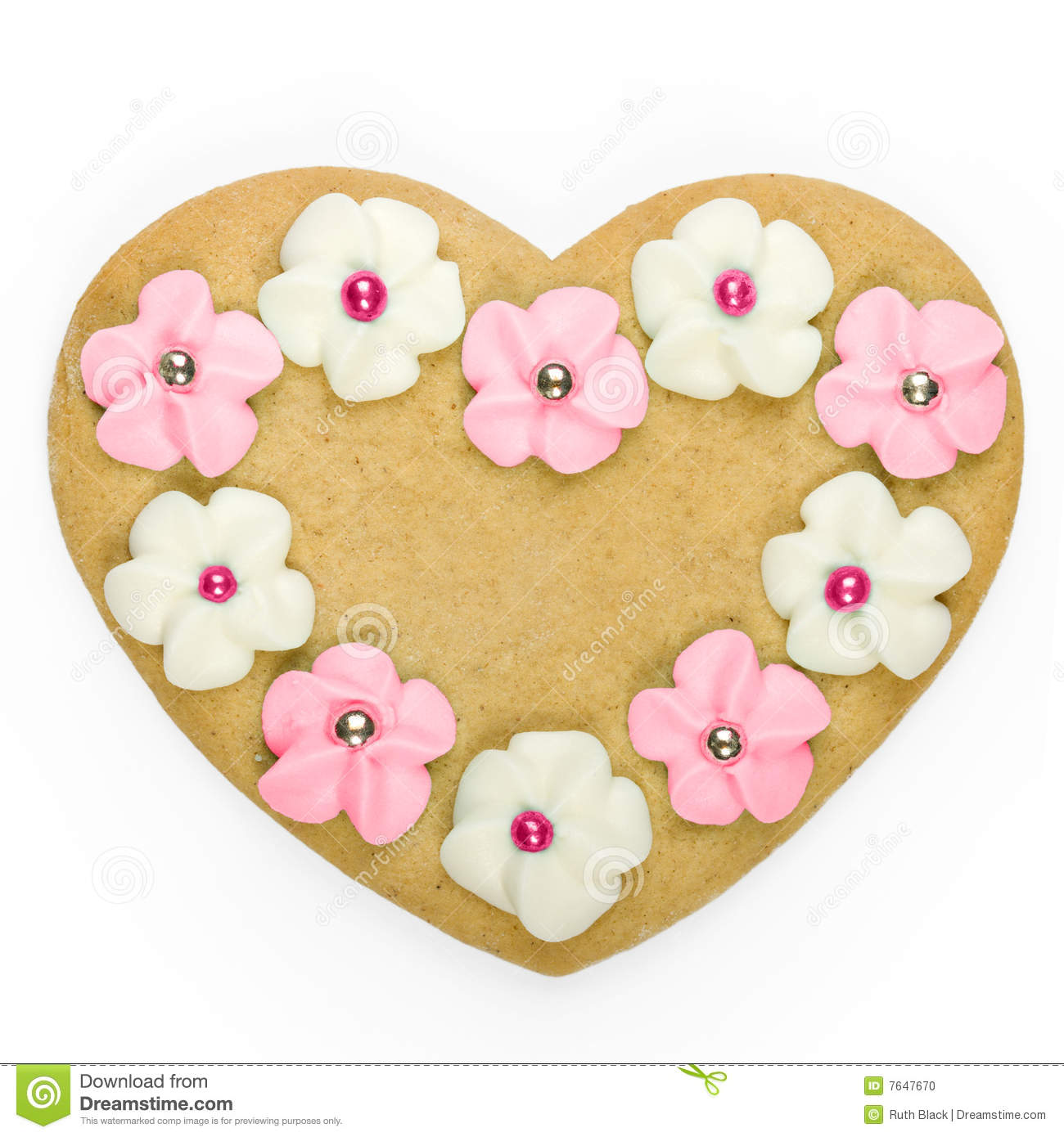Heart Shaped Gingerbread Cookie Decorated With Sugar Flowers