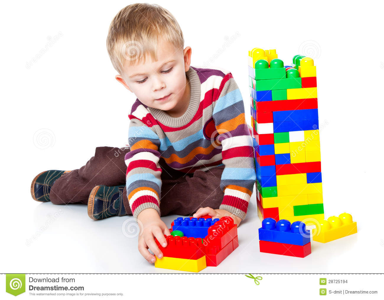 Funny Boy Is Playing With Lego  Isolated On A White Background