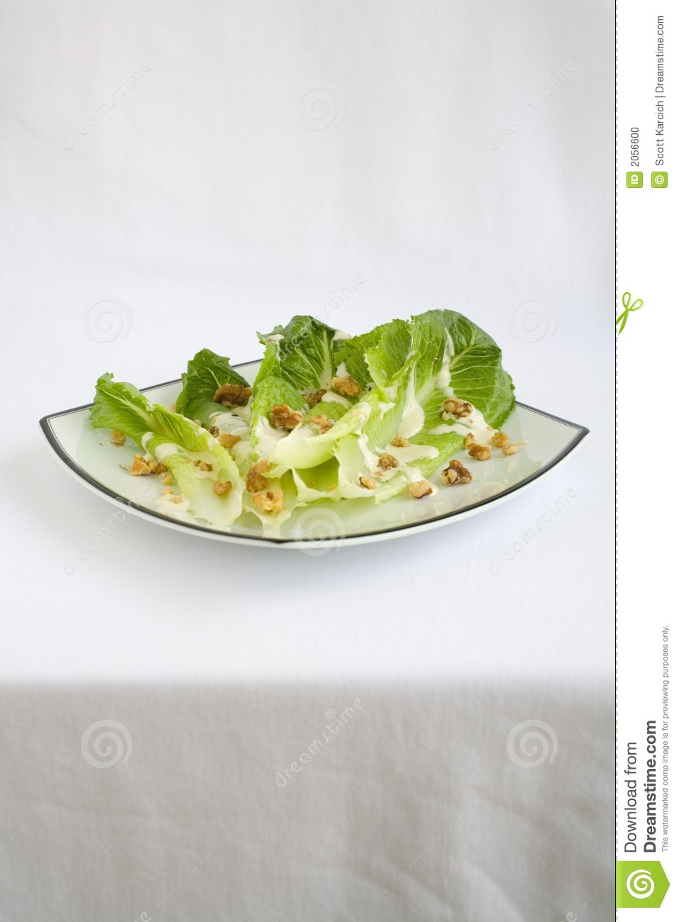 Salad With Romaine Lettuce Walnuts And Creamy Ranch Dressing 