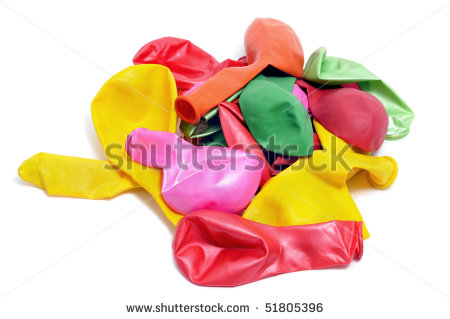 Close Up Of Some Deflated Balloons Of Different Colors Stock Photo