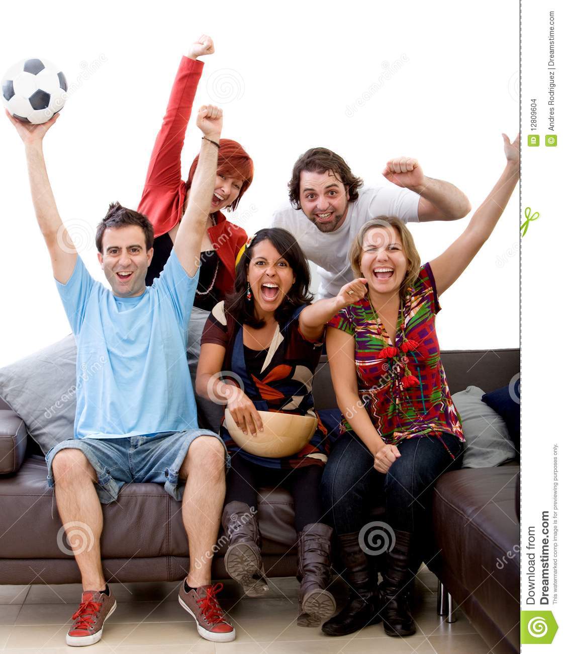 Excited Group Of People Watching Football At Home 