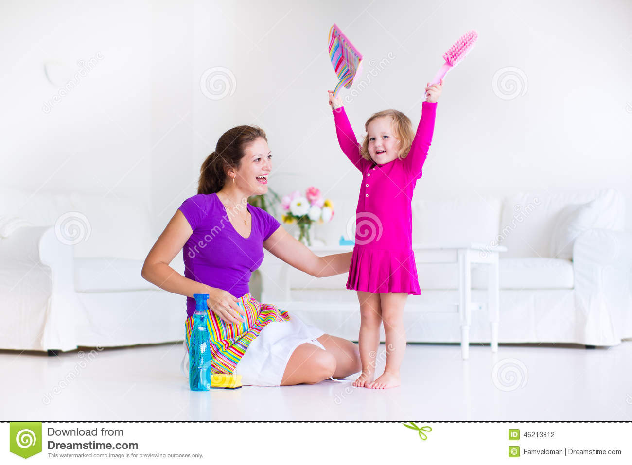 Her Little Daughter Cute Toddler Girl Cleaning The House Together