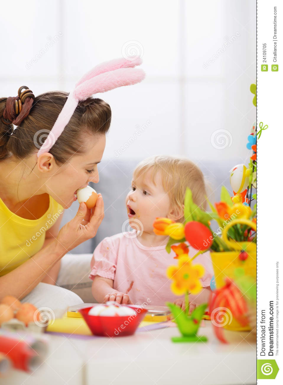 Mother And Baby Eating Easter Egg Royalty Free Stock Photo   Image