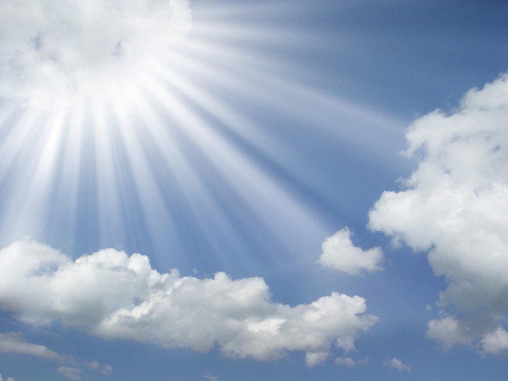 Sun Rays Coming Out Of The Clouds In A Blue Sky2 New Heaven On
