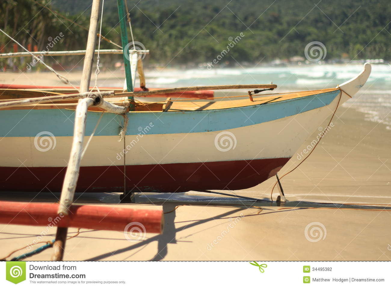 Traditional Filipino Banca Fishing Boat Ready To Launch On Beach 