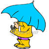 Person In A Raincoat And Boots Under A
