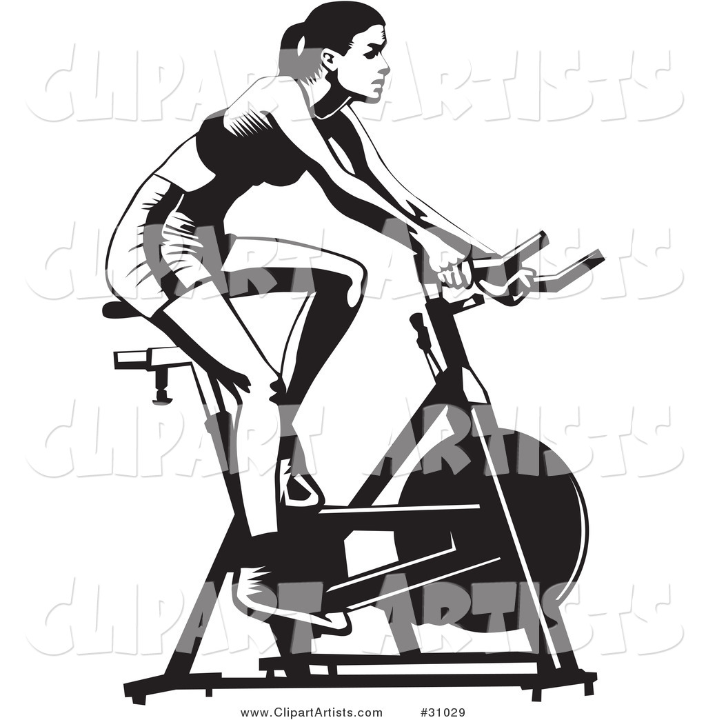 31029   Healthy Woman Exercising On A Stationary Bicycle In A Gym