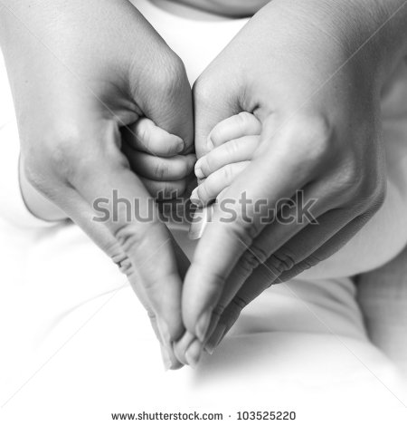 Baby Holding Mother Finger And Together Form A Heart Shape By Hand