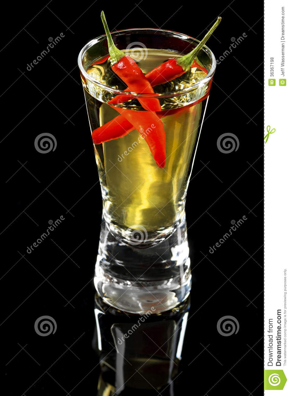 Hot Chilli Pepper Vodka Or Tequila Shooter Glass On Black Background