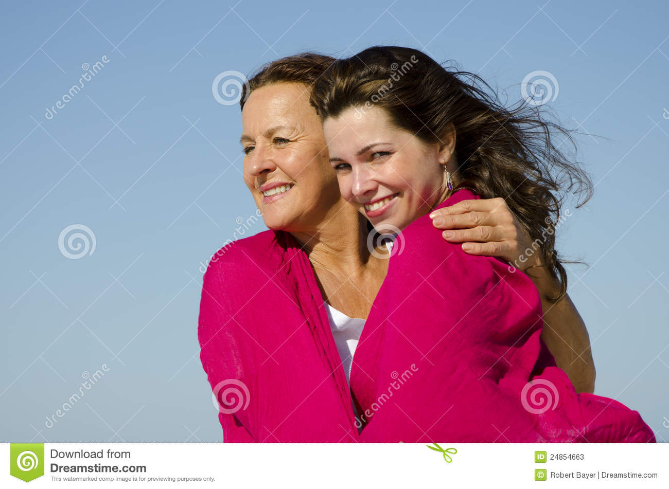 Attractive Looking Couple Of Mother And Daughter Hugging On A Sunny