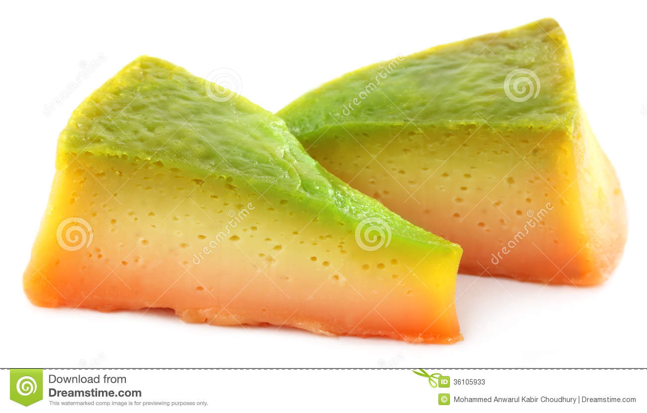 Close Up Image Of Sliced Pudding Over White Background 