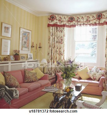 Pink Sofas And Yellow Striped Wallpaper In Living Room With Glass View