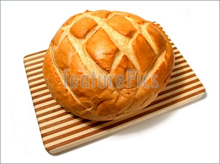 Picture Of Loaf Of Sourdough Bread On Cutting Board Isolated On White    
