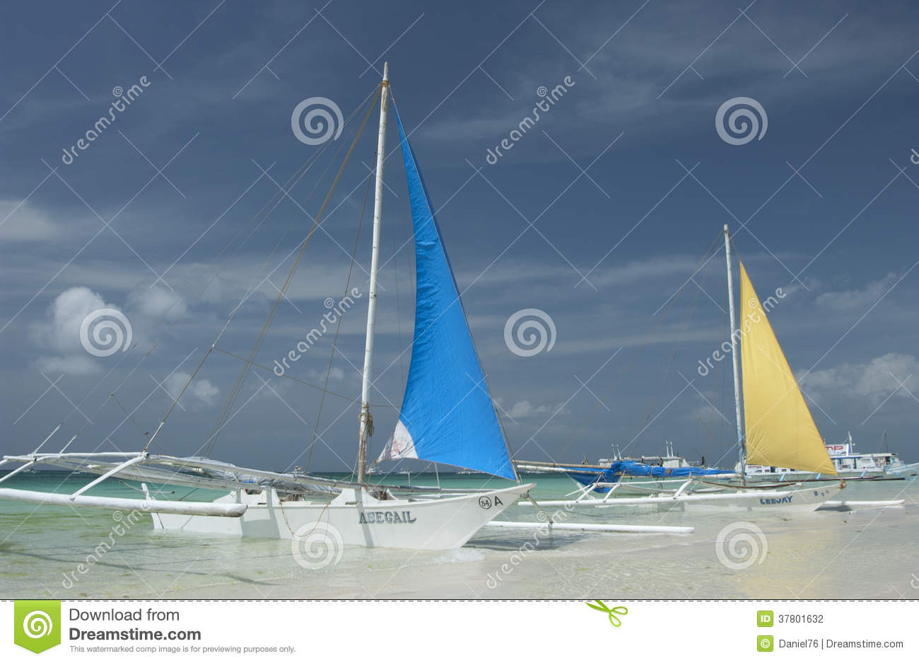 Banca Boats In The Water Outside Boracay Beach In The Philippines
