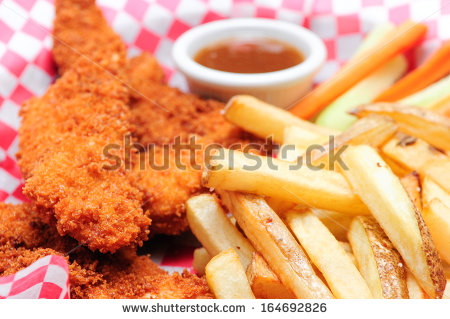 Chicken Tenders And French Fries In A Basket Breaded Chicken Strips