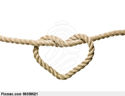 Heart Shaped Knot On A Rope Isolated Stock Photo