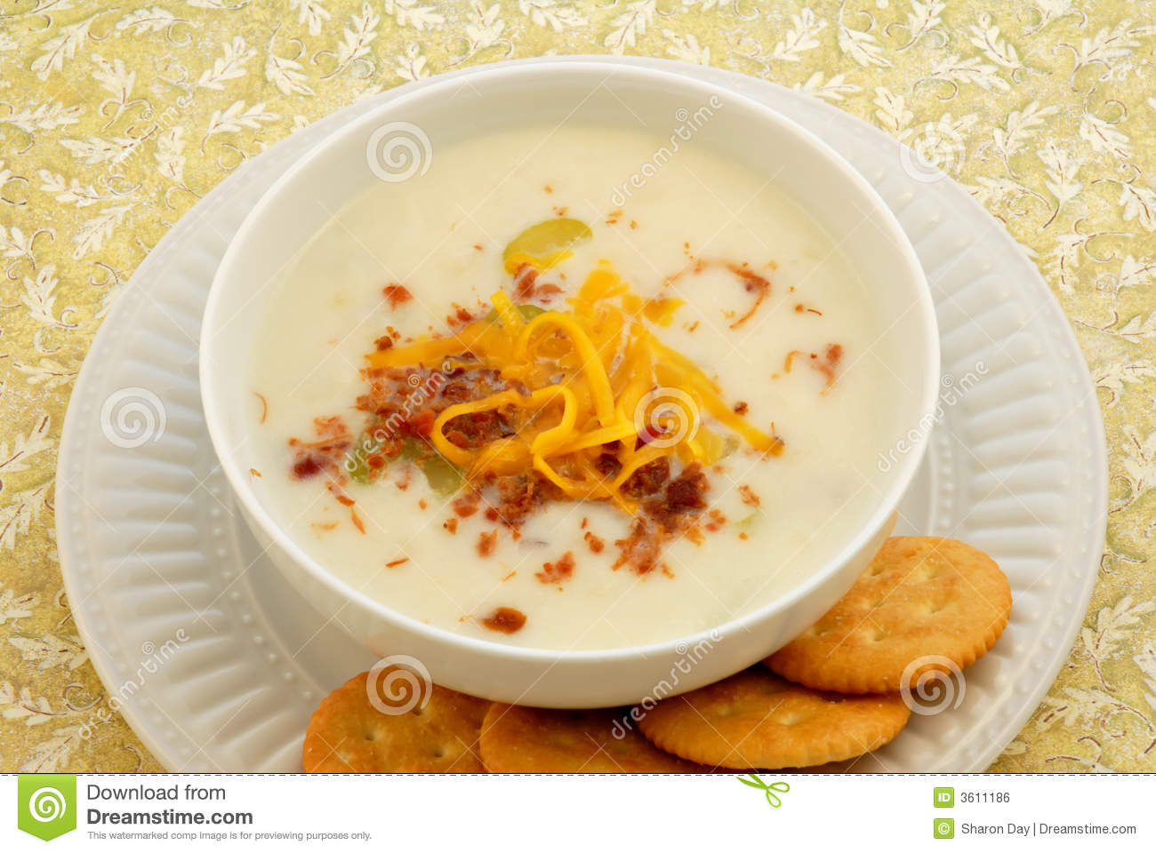 Warm Delicious Bowl Of Homemade Potato Soup With Crackers On The Side