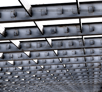 Pattern Of Gray Steel Girders In Preparation For Roof Construction    