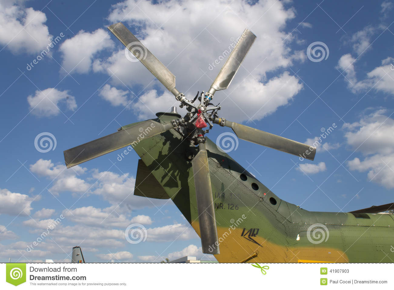 Five Screw Blade Military Helicopter Propeller With A Blue Sky