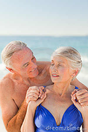 Man Hugging His Wife At The Beach Stock Photo   Image  18495870