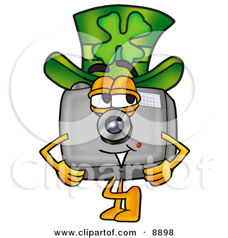 Camera Mascot Cartoon Character Wearing A Saint Patricks Day Hat With