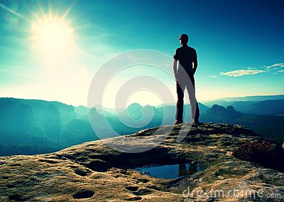 Alone Man In Red Cap On Peak Of Sharp Peak In Rock Empires Park And