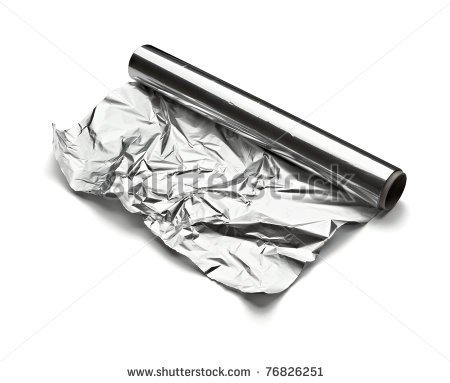 Close Up Of Aa Aluminum Foil On White Background With Clipping Path    