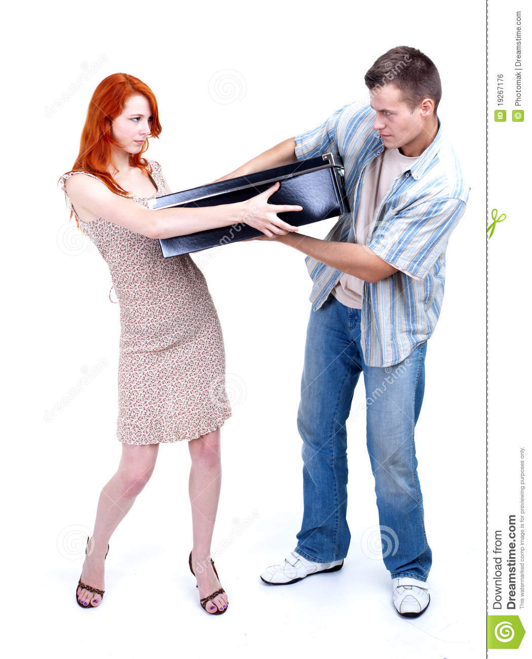 Divorce Couple Fighting About Big Black Box Royalty Free Stock Image
