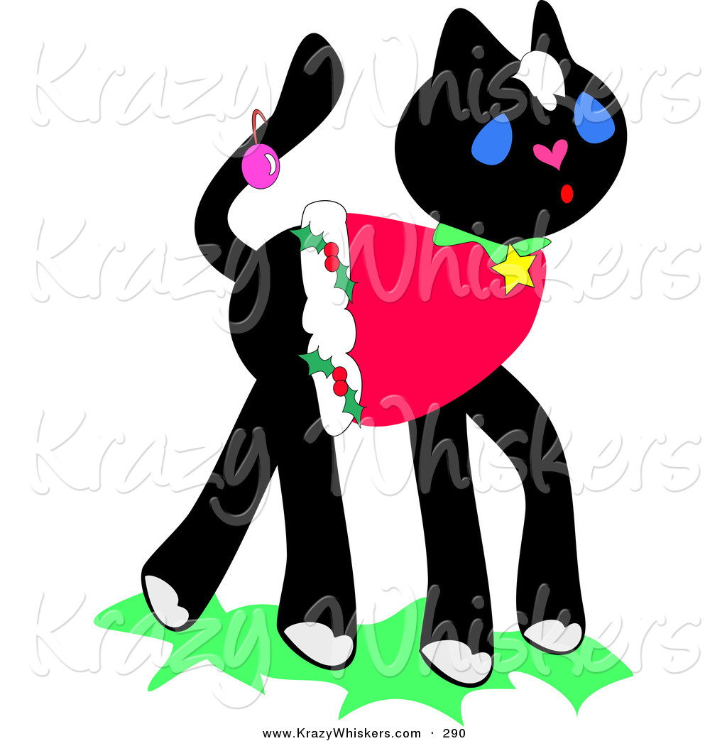 Festive Black Kitten Wearing A Christmas Shirt And An Ornament On Her
