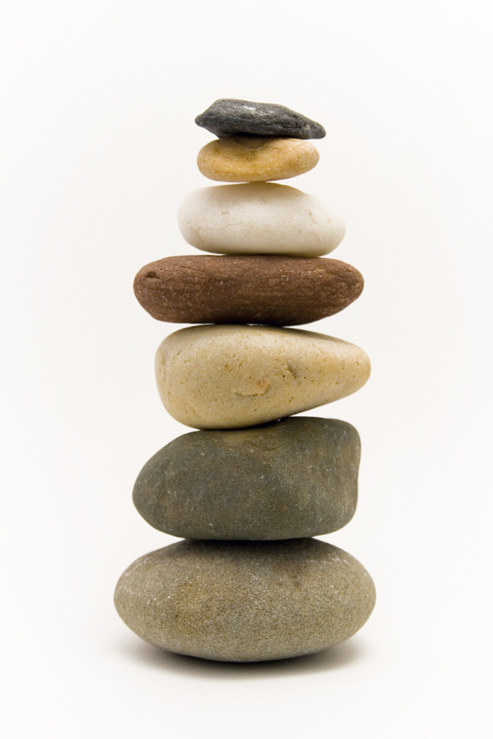 Stones Balancing One On Top Of Another Harmoniously Isolated On A